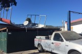 Ventura Fire crews secure metal roof dislodged by high winds