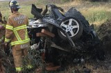 Crew free Pair trapped in car rolled over and on fire near 126 FWY