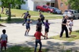 ‘Karen’ Reports Kids for Playing Football in the Street–Then Cops Respond by Joining the Game
