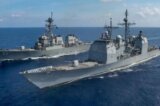 Video: Iranian Gunboats Point Machine Guns, Swarm US Warship
