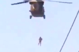 Watch: Man Hangs From U.S.-Supplied Black Hawk Helicopter In Afghanistan